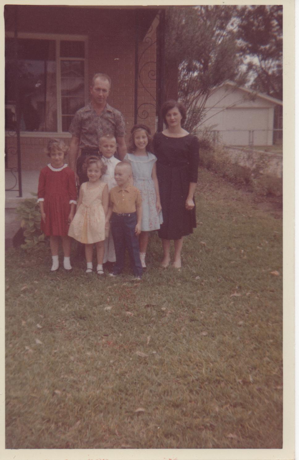 Frank and Mary with Rene, Rebecca, Russell, Rory, and Rachel on Russell's first communion